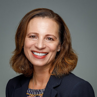 A headshot of Lori Tinkey